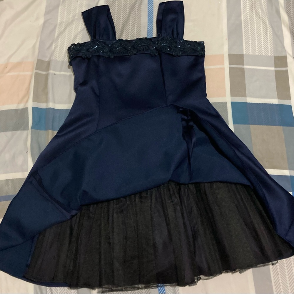 Dark blue knee length dress with long sleeve overlay